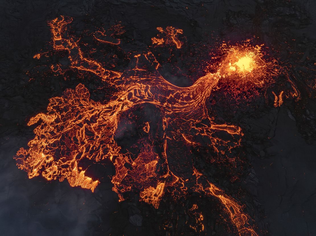 Red lava flows from a volcano in Grindavík, Iceland, which caused the town to evacuate.