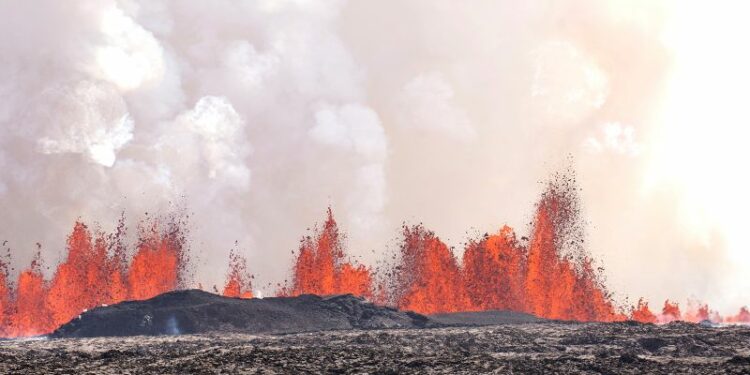 Iceland volcano dramatically erupts again as streams of lava reach town’s defensive walls