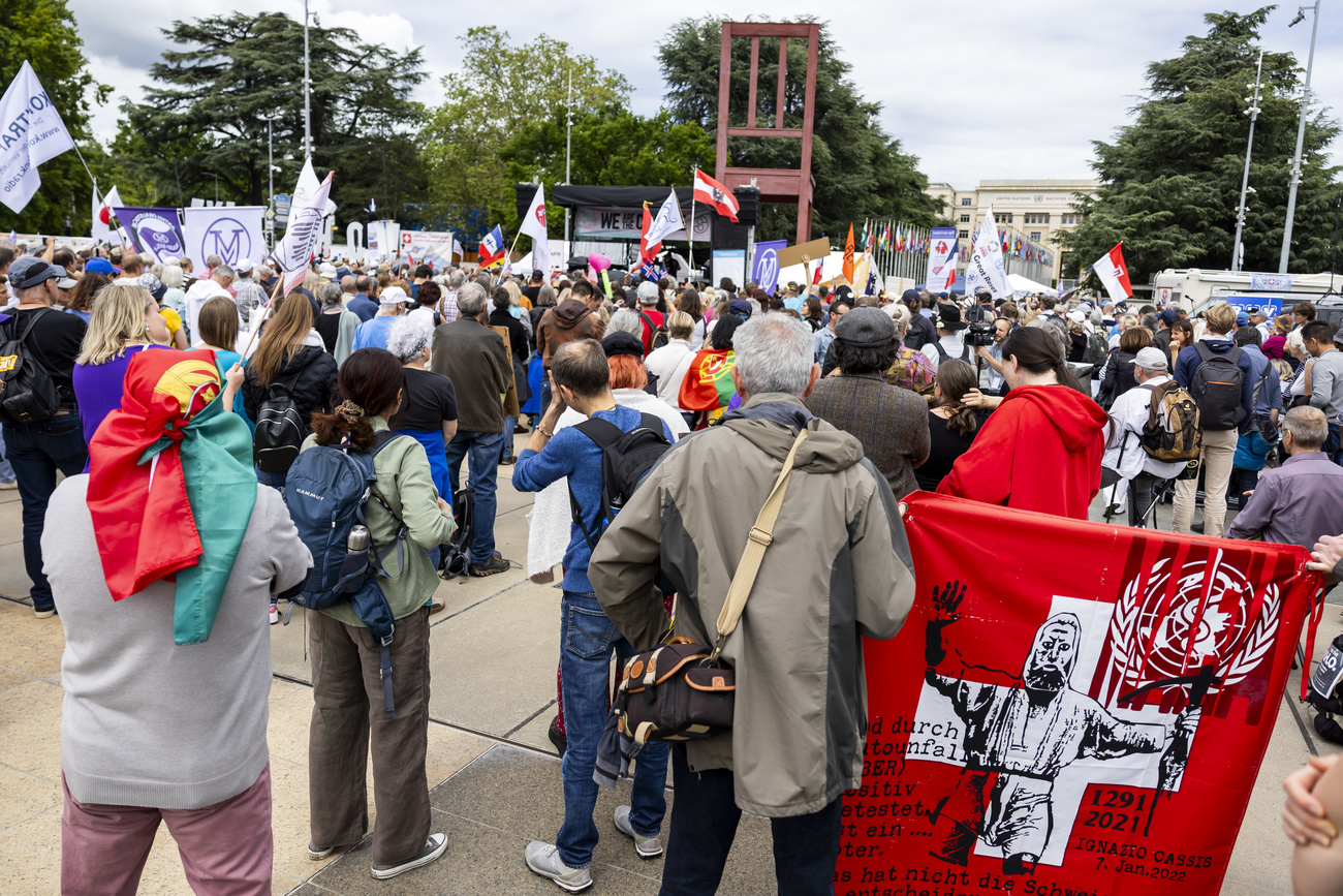 Activists protest against the World Health Organization (WHO) pandemic agreement during a rally on Place des Nations in front of the European headquarters of the United Nations in Geneva, Switzerland, Saturday, June 1, 2024.