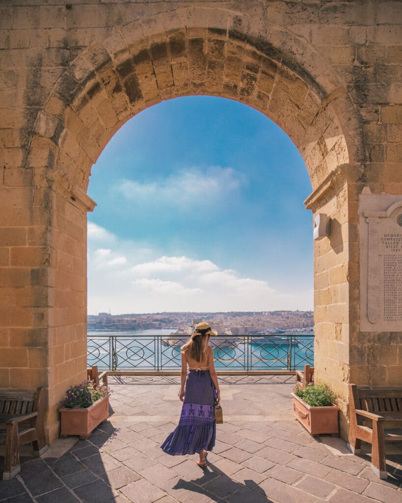 A woman under an arch