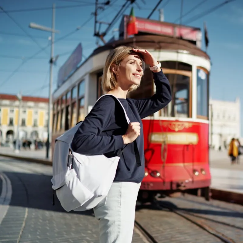 young woman digital nomad in lisbon portugal