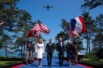 The French and American presidents with the wives Brigitte Macron (left) and Jill Biden (right). AP