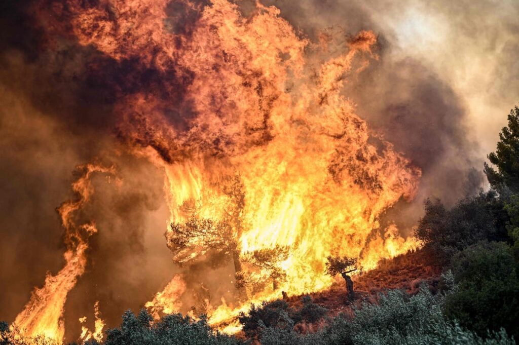 Europe wildfires mapped as two killed in Greece and hospital evacuated