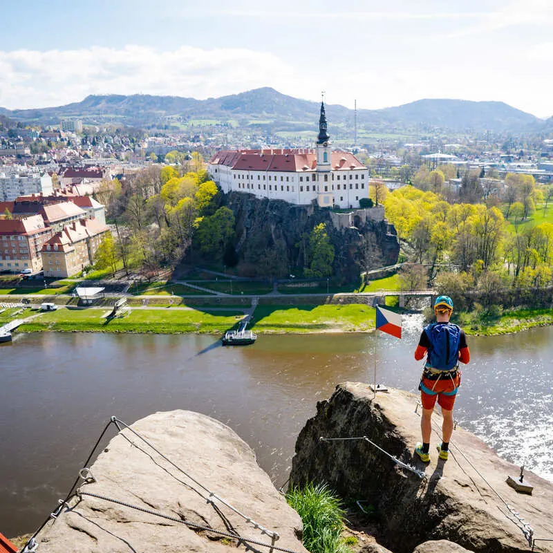 Young Tourist Admiring A View Of A Historic Town In Czechia, Czech Republic, Central Europe