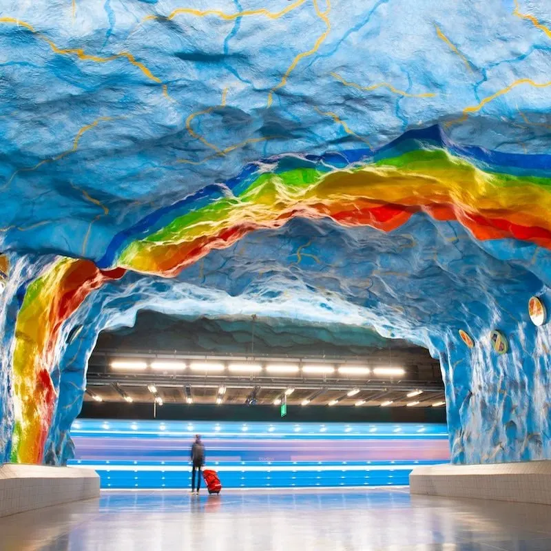 Passenger with a trunk at the Stadium metro station in Stockholm waiting for an underground train, Sweden.