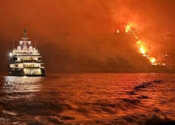 Fireworks launched from yacht ‘spark forest fire in Greece’ leading to 13 arrests