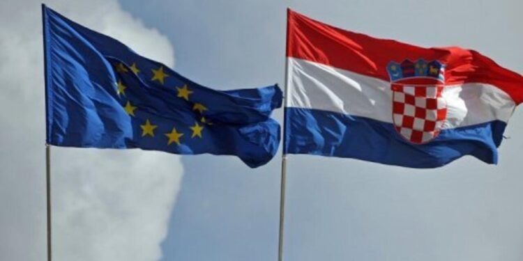 Mired in recession, Croatia becomes 28th EU member