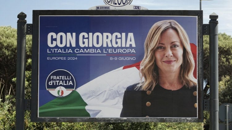 Woman on election poster saying (in Italian)