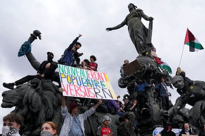 Protesters hold an anti-far right banner during a rally in Paris. AP