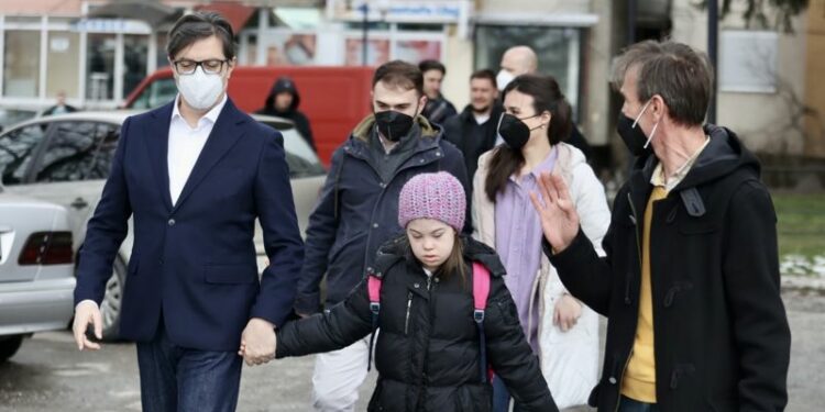 North Macedonia’s President walks bullied 11-year-old girl with Down syndrome to school