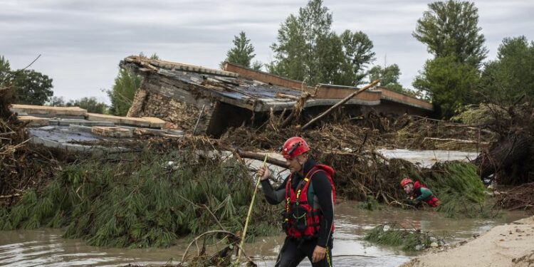 Boy rescued after spending the night clinging to a tree to escape deadly flooding in Spain