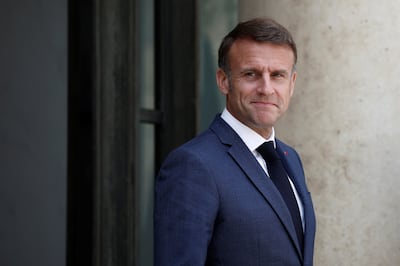 French President Emmanuel Macron waits for the arrival of a guest at the Elysee Palace in Paris, France, June 26, 2024.  REUTERS / Benoit Tessier