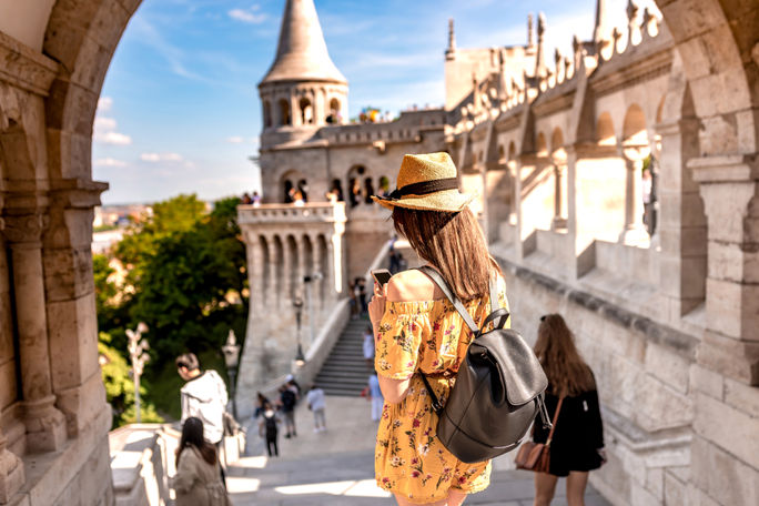 A young woman enjoying her trip to the Castle of Budapest