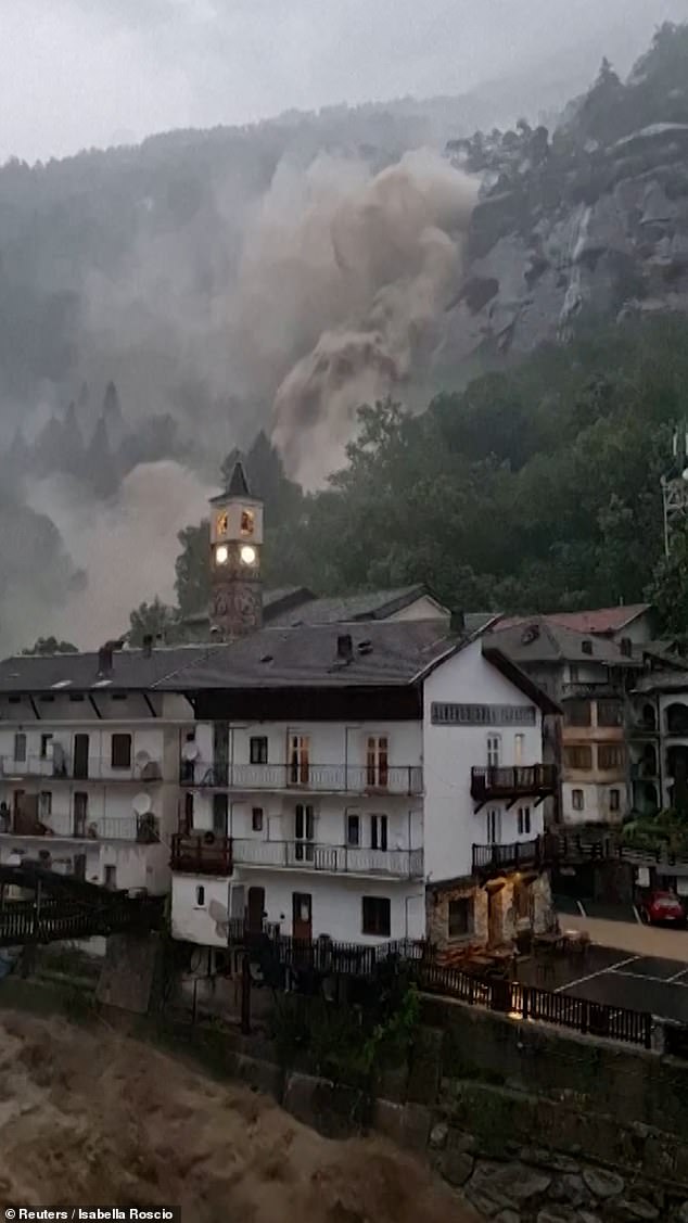 Pictured above is the 'water bomb' that rained down on the northern Italian town of Noasca