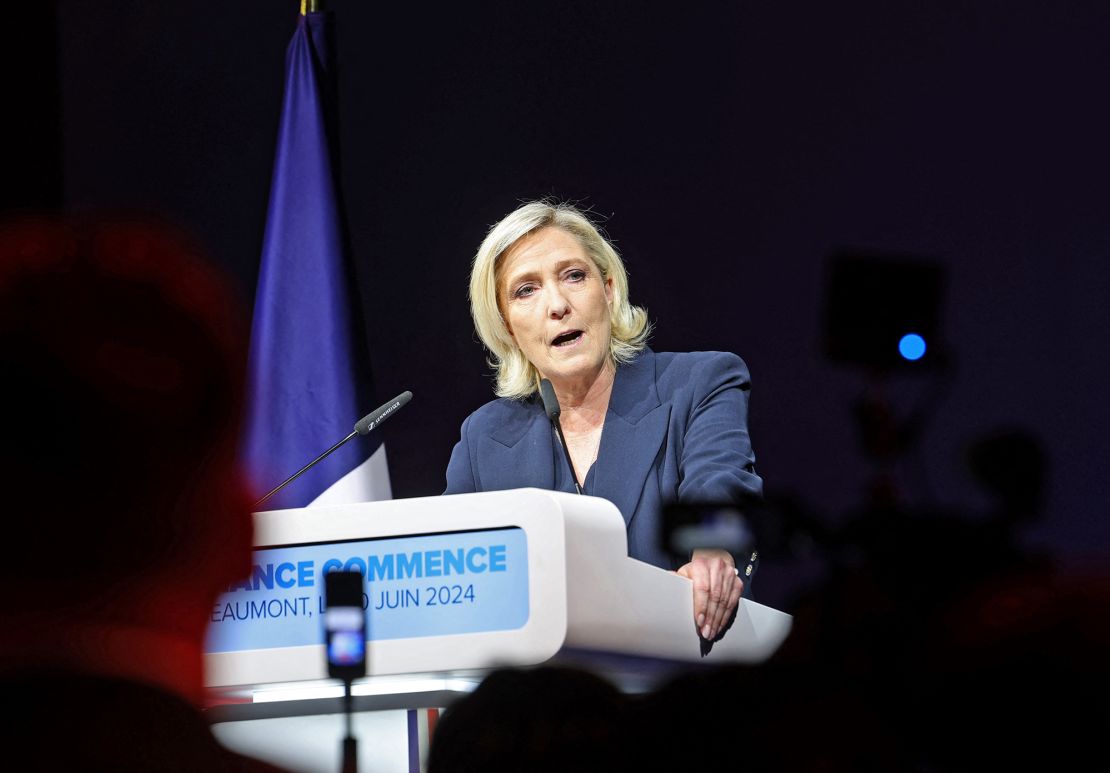 Marine Le Pen gives a speech as results come in for the first round of the French parliamentary elections in Henin-Beaumont, northern France, on June 30, 2024.