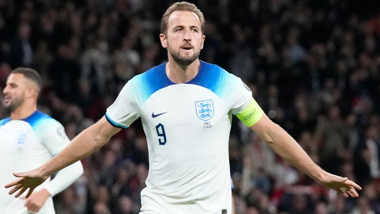 England's Harry Kane celebrates after scoring his side's opening goal from a penalty kick during the Euro 2024 group C qualifying soccer match between England and Italy at Wembley stadium in London, Tuesday, Oct. 17, 2023. (AP Photo/Frank Augstein)