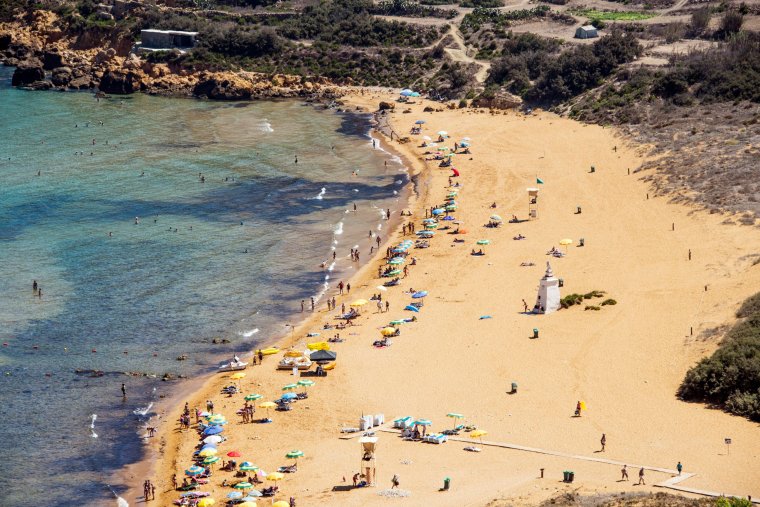 Ramla l-Hamra is a beautiful sandy beach in Gozo on the island of Malta with nice reddish sand it's Gozo???s largest sandy beach with unique bright orange-red colour