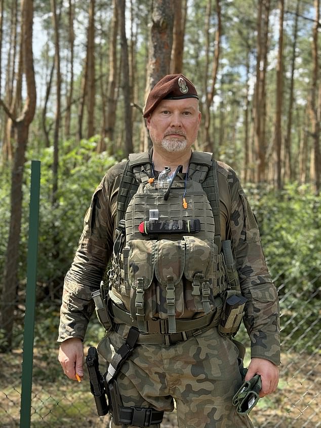 Piotr Placha ¿ one of 20 men and women who honed their skills on the ­shooting range for more than two hours ¿ emerged wearing full military uniform, ­including body armour, pistol  and Kalashnikov slung over his shoulder