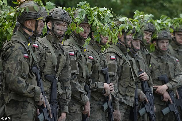 Polish volunteers join a military training camp