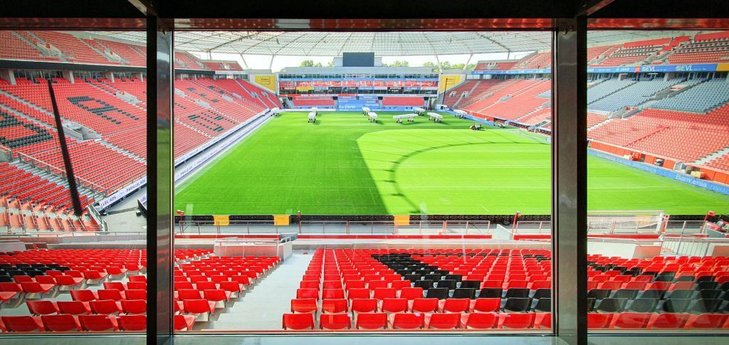 Leverkusen football stadium seats and green grass field