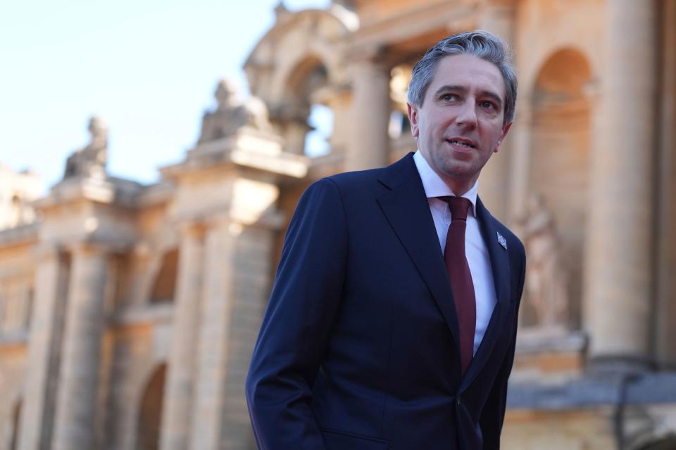 Taoiseach Simon Harris arrives to attend the European Political Community summit at Blenheim Palace (AP)