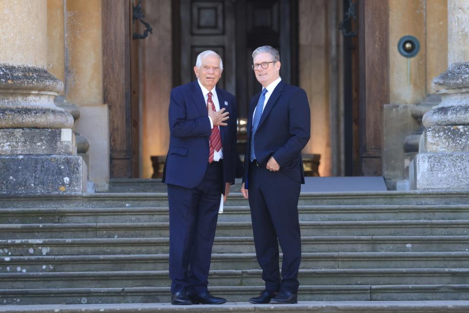 British Prime Minister Keir Starmer (R) greets European Union's High Representative for Foreign Affairs and Security Policy and Vice-President of the European Commission Josep Borrell (L) upon his arrival for the European Political Community (EPC) meeting at Blenheim Palace (EPA)