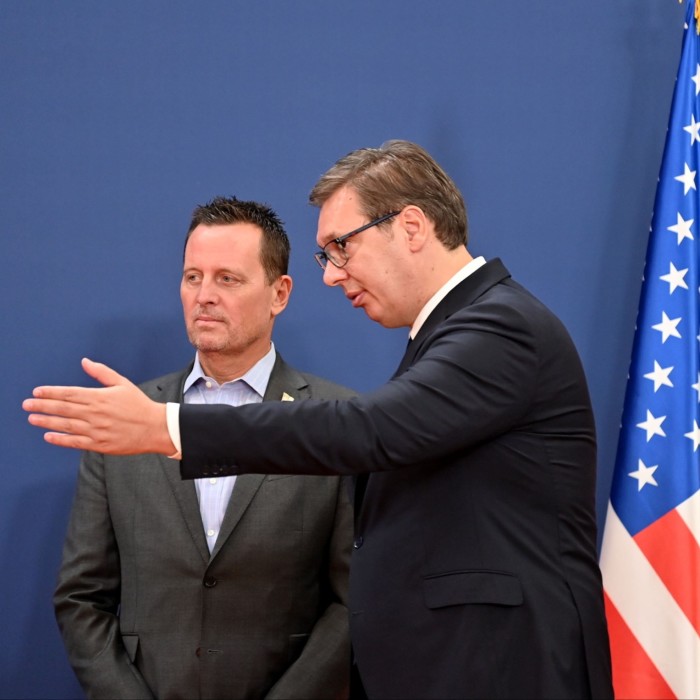 Richard Grenell, left, a US envoy during the Trump presidency, meets the Serbian president, Vučić, in September 2020 