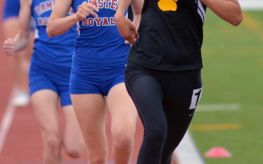 Patch'a Julia Lockridge leads Ramstrin's Madison Morse and Katelyn Schultz in to the final lap of the girls 800-meter race at the DODDS-Europe track and field championships in Kaiserslautern, Germany, Friday, May 22, 2015. Lockridge won the race in 2 minutes, 16.67 seconds setting a new DODDS-Europe record. It was her second of the day after winning the 1600-meter race earlier in the afternoon.