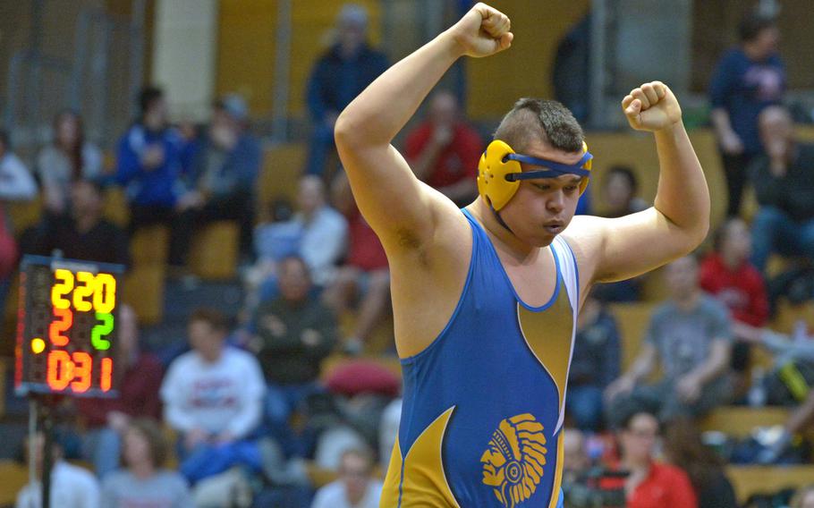 Wiesbaden's Hunter Lunasin celebrates after defeating Lakenheath's Colten Menges in the 220-pound final at the DODDS-Europe wrestling championships in Wiesbaden, Germany, Saturday, Feb. 14, 2015. Lunasin was named the  boys DODDS-Europe Athlete of the Year.