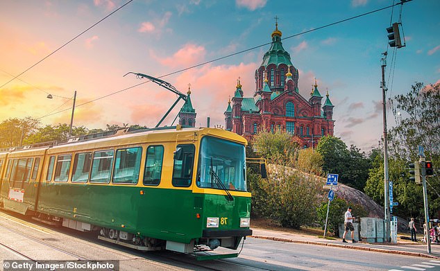 Helsinki, Finland's capital, on a summer evening, with the Uspenski Cathedral in the distance