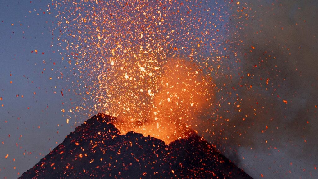 Dramatic photos of recent Mt. Etna eruption in Italy spewing hot lava - USA TODAY