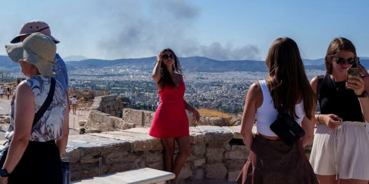 Greece shuts Acropolis during hottest part of day as southern Europe swelters in a heat wave