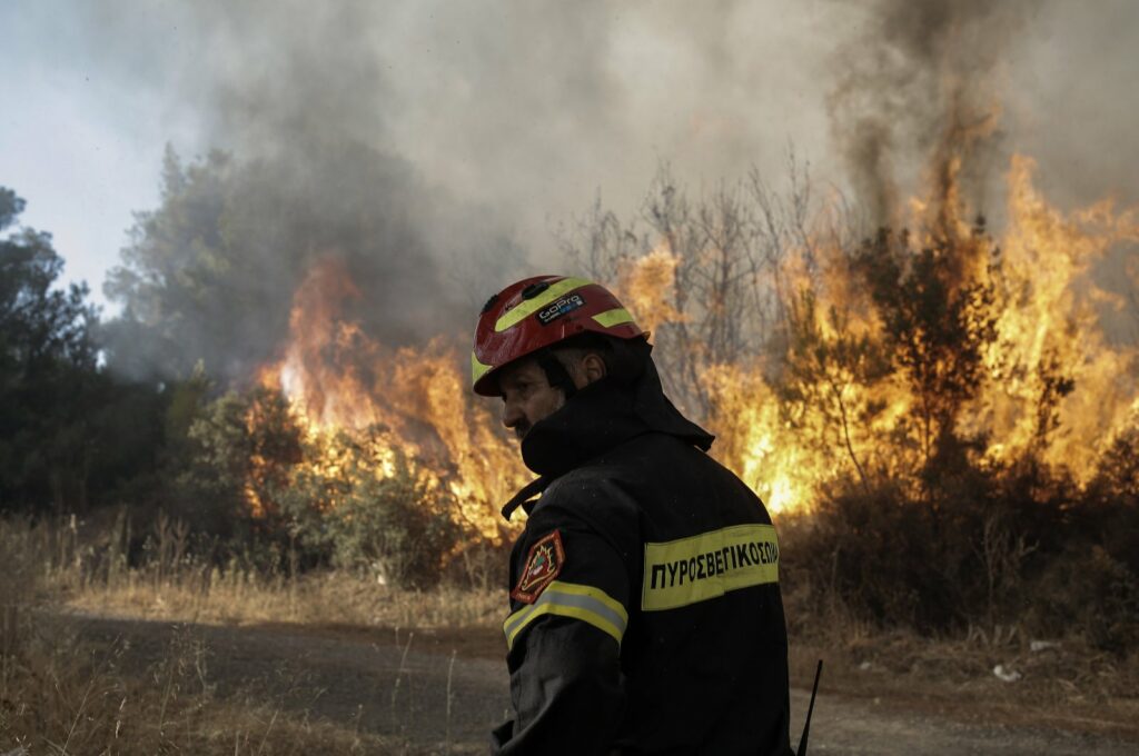 Greece tackles dozens of wildfires brought on by earliest heat wave