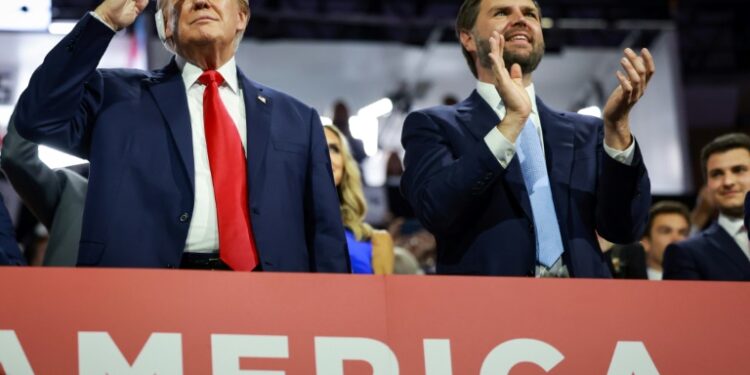 Republican presidential candidate Donald Trump (L) and his running mate J.D. Vance on the first day of the Republican National Convention in Milwaukee (JOE RAEDLE)