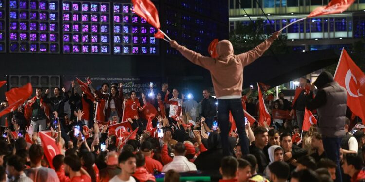 Turkish delight! Jubilant Turks set off fireworks and party in the streets early into the morning across Europe as they celebrate their nation's 2-1 victory over Austria to set up a clash with the Netherlands in the quarter-finals of Euro 2024