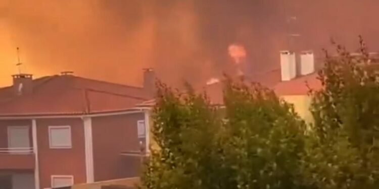 Wildfires rip through Portuguese region loved by Brits while France and Holland are hit with flash floods and hikers are killed by lightning in Germany and Austria as Europe sees wild weather extremes