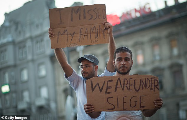 Migrants protest outside Keleti station, Budapest, which was closed to them in September 2015  (file picture)