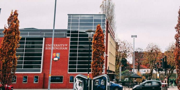 a city street with cars parked on the side of it