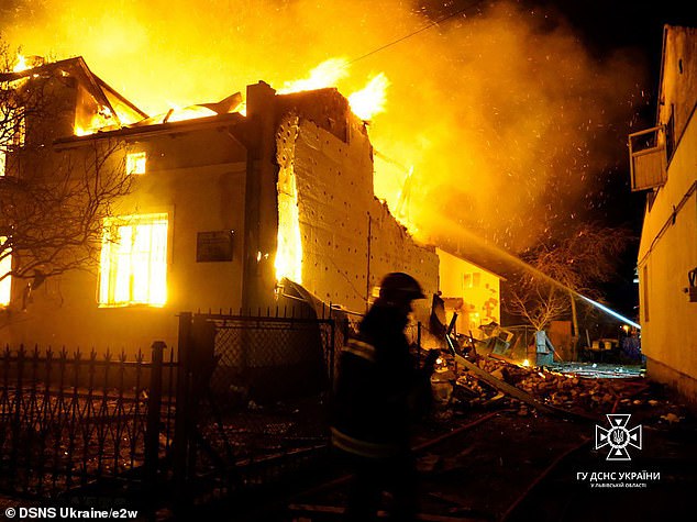 Residences in Ukraine are seen ablaze amid Russian missile attacks