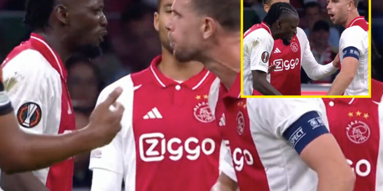 Jordan Henderson squares up to Ajax teammate Bertrand Traore before giving X-rated view of ex-Chelsea star during Europa League clash