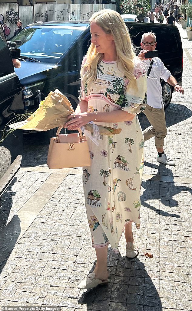 She paid a nod to her upcoming bridal weekend with a white linen dress from ALÉMAIS, retailing online for £405