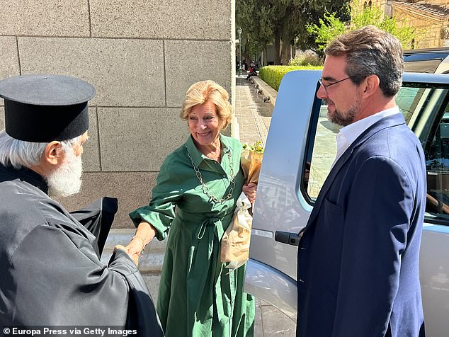 Also present at the Cathedral was Theodora's mother, Queen Anna Maria of Greece, 78, who grinned as she chatted with others in a green linen summer dress