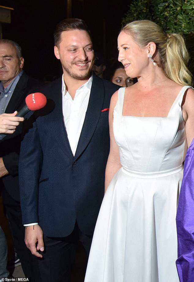 Theodora and Matthew speaking before their pre-wedding dinner in the Greek capital