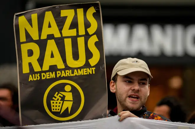 Protesters at the party&squot;s final election rally on Friday night waved banners reading 