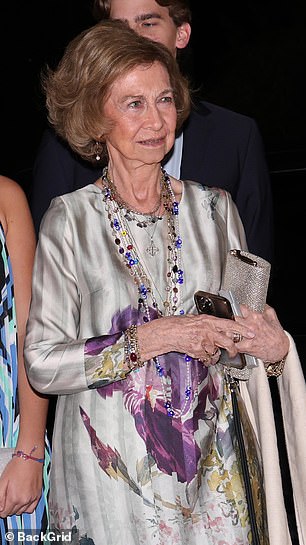 Queen Sofia of Spain opted for a chic floral and silver matching top and trousers combo