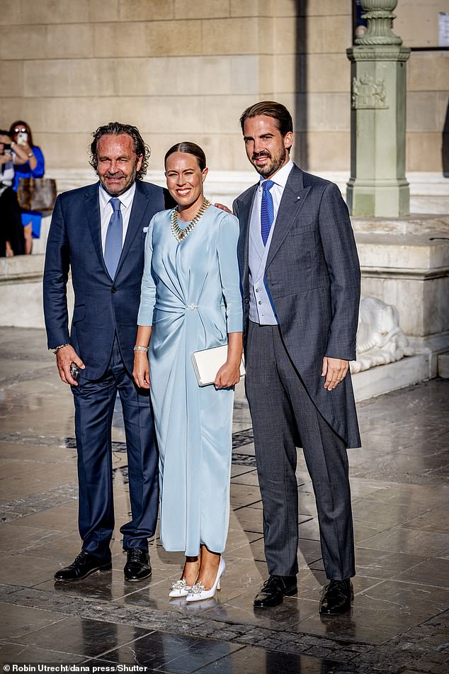 The three were all smiles before they headed into the lavish royal wedding