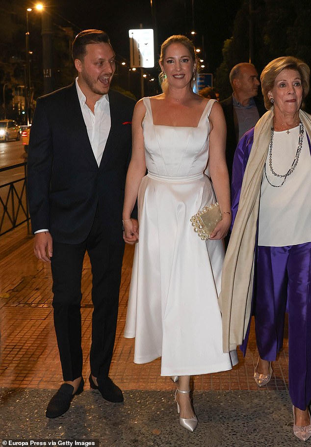 The 41-year-old actress, who was born in London and played secretary Alison Montgomery in The Bold and the Beautiful, appeared radiant in a white midi dress from Greek designer Celia Kritharioti, who is also creating her wedding gown