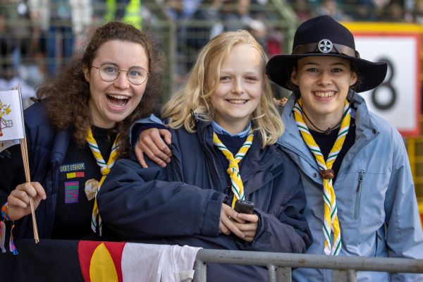 Attendees smile during a papal Mass at King Baudouin Stadium in Brussels, Belgium, Sunday, Sept. 29, 2024. Credit: Daniel Ibáñez/CNA