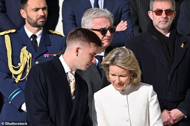 The Belgium royals were also joined by their eldest son, Prince Gabriel of Belgium, 21, who wore a blue overcoat along with a smart suit and gold patterned tie