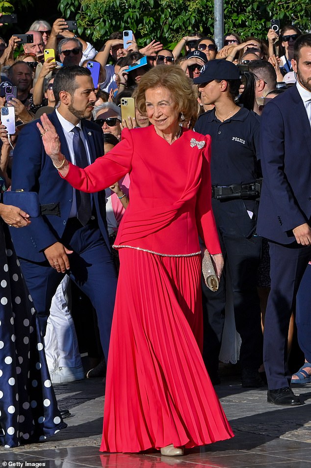 Queen Sofia (pictured), 85, looked striking in a shocking pink outfit by Spanish designer Alejandro de Miguel